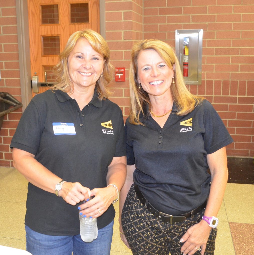 Missy Van Buskirk and Dr. Angie Ridgway, members of the Oriole Advocates executive committee.